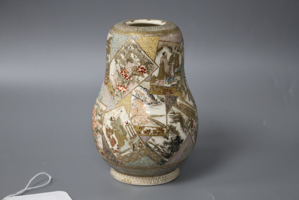 A Satsuma gourd shaped vase, decorated with panels of figures, flowers and landscapes, height 12cm